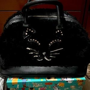 Betsey Johnson gently used black fur type cat purse with pink stones